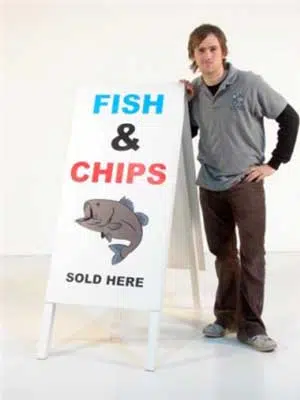 20070405181252_Fish-and-chips-sign-and-person-(Small)