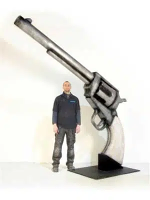 20070622112058_Revolver-and-person-Small