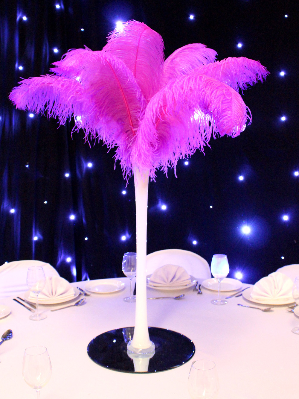 SN2889_Purple_Feather_Display_in_White_Lily_Vase_event_prop_hire_0004_Purple_event_prop_hire_0316IMG_5214_copy