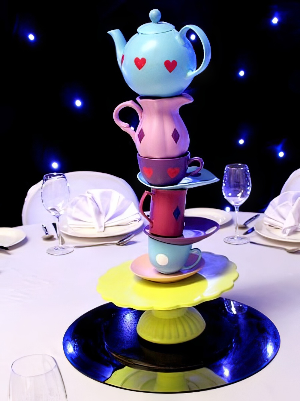 TBL32_Stacked_Crockery_Alice_in_Wonderland_Tea_Party_Table_Centreevent_prop_hire_090_Optimised
