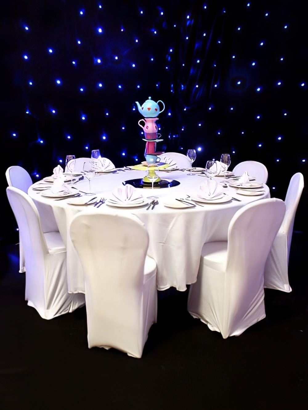 TBL32_Stacked_Crockery_Alice_in_Wonderland_Tea_Party_Table_Centreevent_prop_hire_091_Optimised